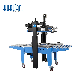 Fxj-6050c Hualian New Arrival Carton Tape Sealer Packing Packaging Machine with Ink Jet Printer manufacturer